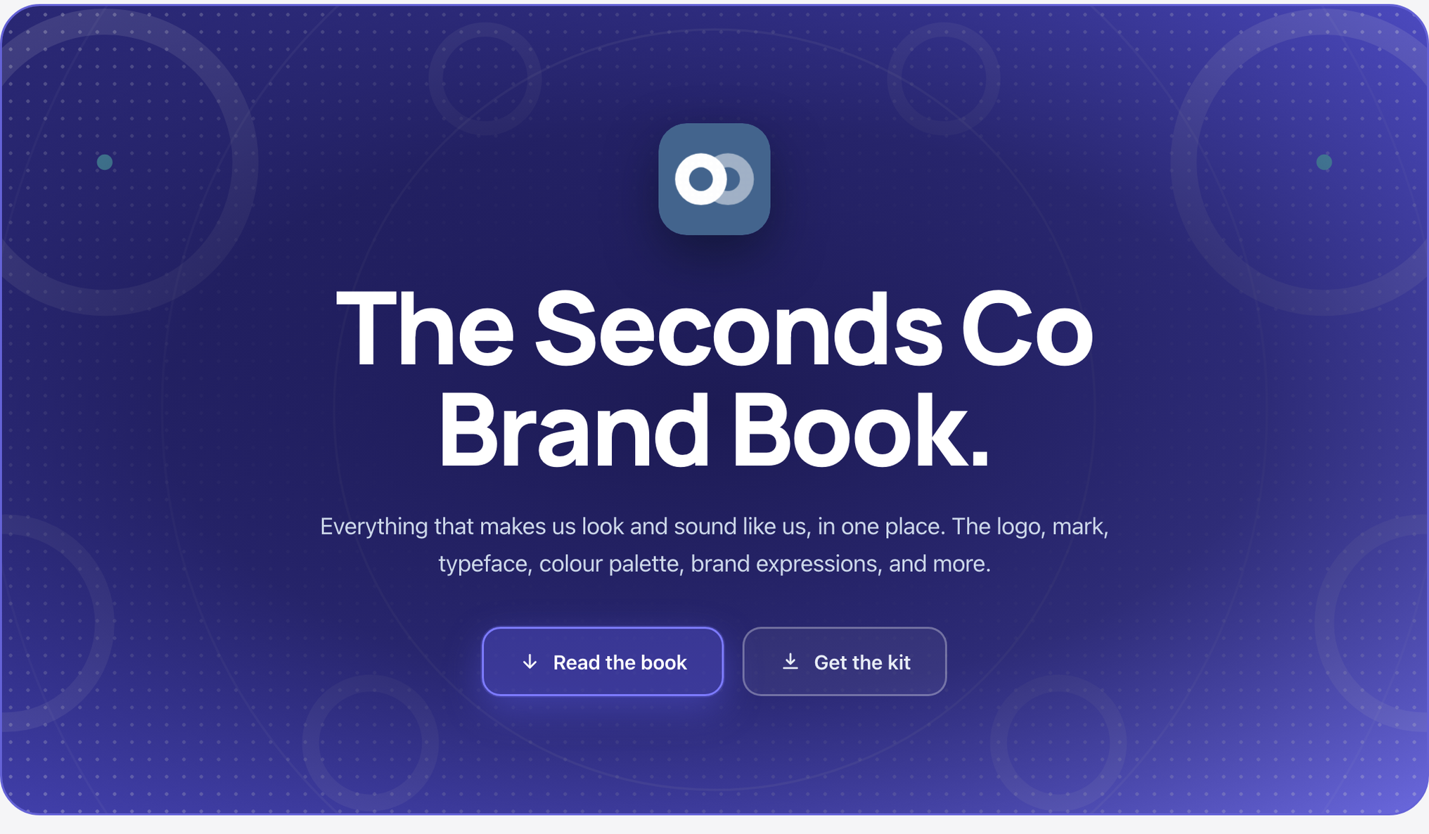 The v8.5 hero card rendered with direction C, Indigo pulse, at 1440px: the two-plate mark, the headline The Seconds Co Brand Book, the subhead, and the Read the book and Get the kit buttons.